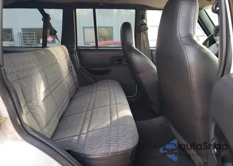 1999 Jeep Cherokee Sport z USA, uszkodzony, nr VIN 1J4FF68S7XL573353